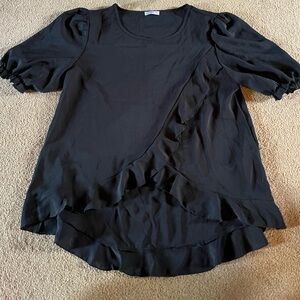 Black ruffled blouse